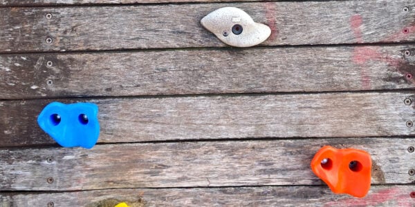 Bouldering wood wall in playground.