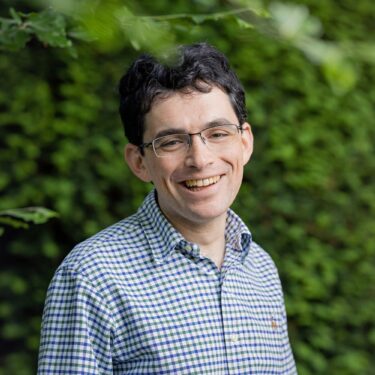 Headshot of Robbie Duschinsky