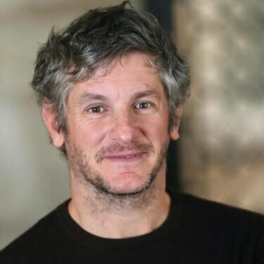 Headshot of Dr Clive Diaz